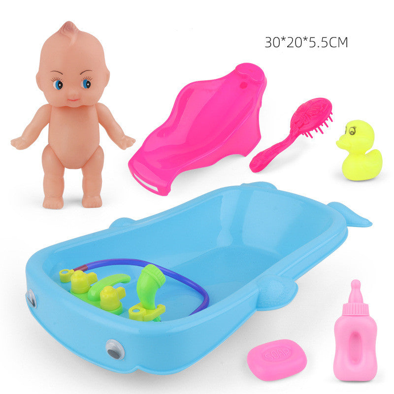 Baby In Tub With Bath Toys