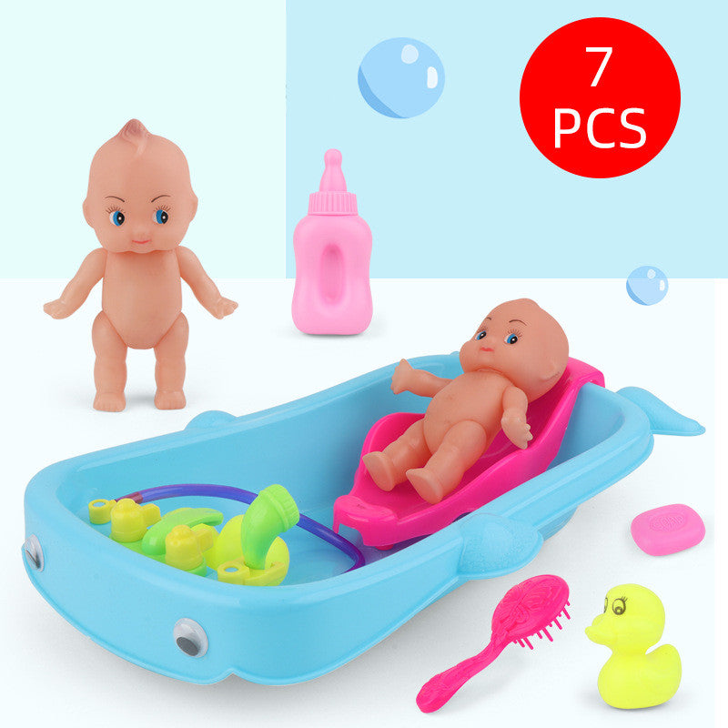 Baby In Tub With Bath Toys
