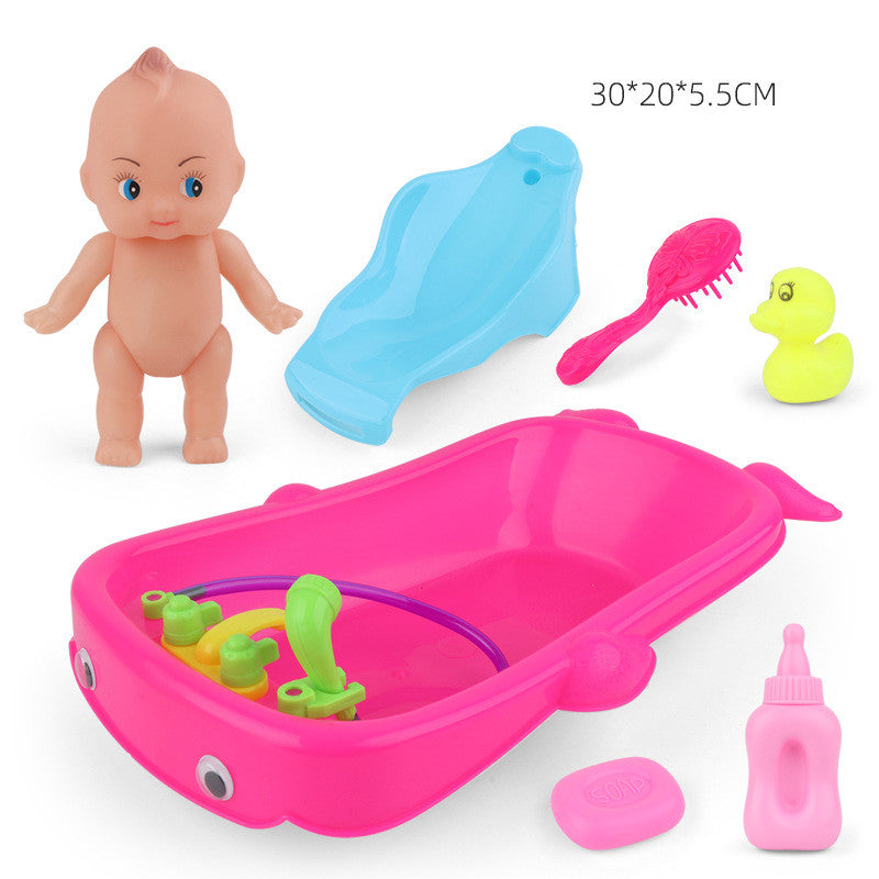 Baby In Tub With Bath Toys